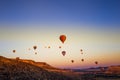 Colorful hot air balloons flying over the valley Royalty Free Stock Photo