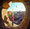 Colorful hot air balloons flying over the valley at Cappadocia