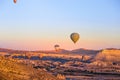 Colorful hot air balloons flying over the valley Royalty Free Stock Photo