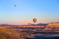 Colorful hot air balloons flying over the valley Royalty Free Stock Photo