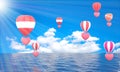 Colorful hot air balloons heart rising above serene the ocean seascape with blue sky background. Beautiful sun light Hot air Royalty Free Stock Photo