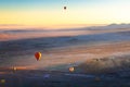 Colorful hot air balloons over the mountains at sunrise in Cappadocia, Turkey Royalty Free Stock Photo