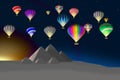 Colorful hot air balloons over scenic pyramids, sunrise Royalty Free Stock Photo