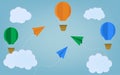 Colorful hot air balloons and paper airplanes flying in the air with blue cloudy sky background. Paper cut poster Royalty Free Stock Photo