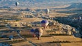 Hot air balloons hovering over the volcanic  valley . Living- Museum, Cappadocia,Turkey, autumn Royalty Free Stock Photo