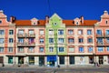 A colorful house in the classical style of an European city