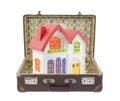 Colorful house in old suitcase