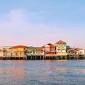 Colorful houses along Chao Phraya River Royalty Free Stock Photo