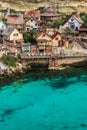 Colorful houses in Anchor Bay, Popeye Village,Malta Royalty Free Stock Photo