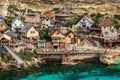 Colorful houses in Anchor Bay, Popeye Village,Malta Royalty Free Stock Photo