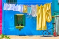 Airing linen in the street in Burano