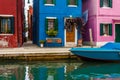 The colorful houses in Burano Island, street with canal, and the