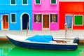 Colorful houses on the canal with boat in Burano island, Venice, Italy Royalty Free Stock Photo