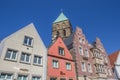 Colorful houses and church tower in the center of Rheine