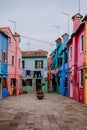 Colorful houses and clothes hanging in Burano Royalty Free Stock Photo