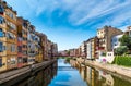 Colorful houses and Eiffel bridge over Onya river in Girona, Spain Royalty Free Stock Photo