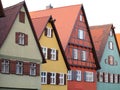 Colorful half-timbered townhouses with exterior shutters at windows Royalty Free Stock Photo