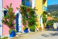 Colorful houses and narrow street of Assos village on Kefalonia island, Greece Royalty Free Stock Photo