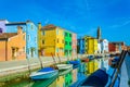 Colorful houses near canal on Burano island, Venice, Italy Royalty Free Stock Photo