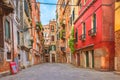 Colorful houses in the old medieval street in Venice, Italy Royalty Free Stock Photo
