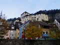 Colorful houses in the old town of Feldkirch, Vorarlberg, Austria with Schattenburg in the background.