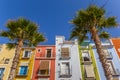 Colorful houses and palm trees in Villajoyosa