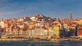 Colorful houses of Porto Ribeira, traditional facades, old multi-colored houses with red roof tiles on the embankment in the city Royalty Free Stock Photo