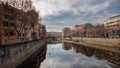 Colorful houses reflected in the Onyar river, in Girona, Catalonia, Spain. Church of Sant Feliu and Cathedral of Santa MarÃ Â­a in Royalty Free Stock Photo