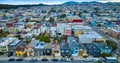 Colorful houses side by side in endless rows in large city aerial