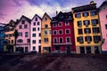 Colorful houses under purlpe sky