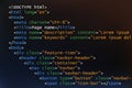 Colorful HTML code on dark background