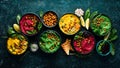Colorful hummus bowls. Flat-lay of various vegetarian dips hummus.