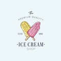 Colorful Ice cream shop logo label or emblem in caartoon style for your design on suburst background. Vector Royalty Free Stock Photo