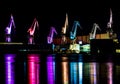 Colorful Illuminated Cranes in Harbor in the Night Royalty Free Stock Photo