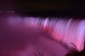 Colorful illuminated Niagara Waterfalls at night in Ontario, Canada Royalty Free Stock Photo