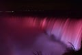 Colorful illuminated Niagara Waterfalls at night in Ontario, Canada Royalty Free Stock Photo