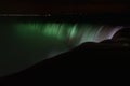 Colorful illuminated Niagara Waterfalls at night in Ontario, Canada Royalty Free Stock Photo