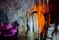 Colorful illuminated stalactites at Stalactites Cave also known as Soreq Cave and Avshalom Cave