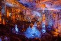 Colorful illuminated stalactites at Stalactites Cave also known as Soreq Cave and Avshalom Cave