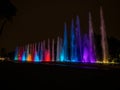 Colorful illuminated water fountains light art installation Circuito magico del Agua in Parque de la Reserva Lima Peru