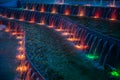 Colorful illuminated waterworks at evening