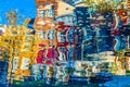 Colorful illustration of the buildings reflection along the canal in Amsterdam in the autumn