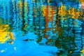 Colorful illustration of the buildings reflection along the canal in Amsterdam in the autumn