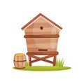 Large wooden beehive and barrel with sweet honey. Bee house. Farm and apiary theme. Cartoon vector design