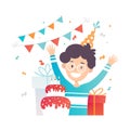 Little happy boy, his Birthday cake and presents. Funny kid with hands up. Cute kid in party hat. Flat vector design Royalty Free Stock Photo