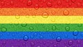 Rainbow drops on a vibrant background Royalty Free Stock Photo