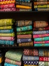 Colorful indian female cloths stack in wholesale shop Royalty Free Stock Photo