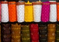 Colorful indian female cloths stack in wholesale shop