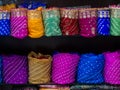 Colorful indian female cloths stack in wholesale shop