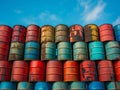 Colorful Industrial Oil Barrels Against Sky